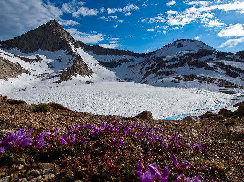 Our first view of Columbine Lake under the Sawtooth Peak, with signs of spring in July...