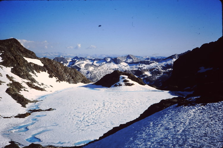 This photo has been an inspiration to me. I went back 4 years later and hiked around the left side of the frozen lake and then dropped into the basin. We then did a cross country pass over to Blackcap Basin. Probably the most difficult and awesome trip I've ever done.