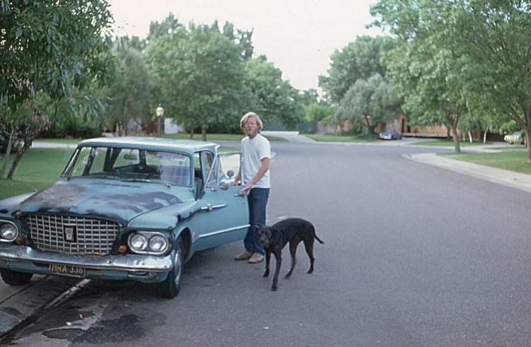 My lavish ride and Gina, our family dog. Note stylish summer haircut. One haircut a year back then.