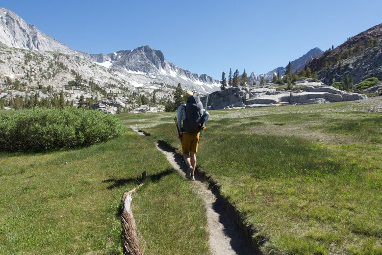 Hiking through meadows below Big McGee Lake