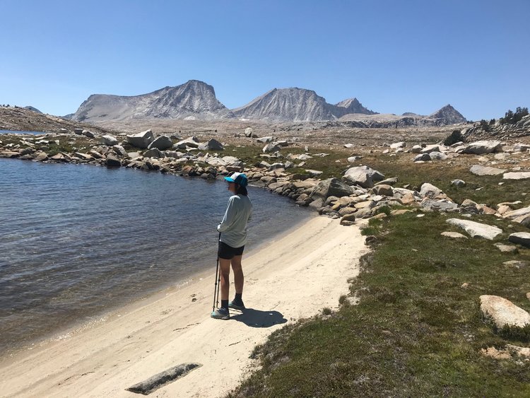 Enjoying the multiple beaches while walking around French Lake