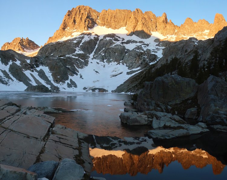Iceberg Lake at sunrise, thin ice on the lake