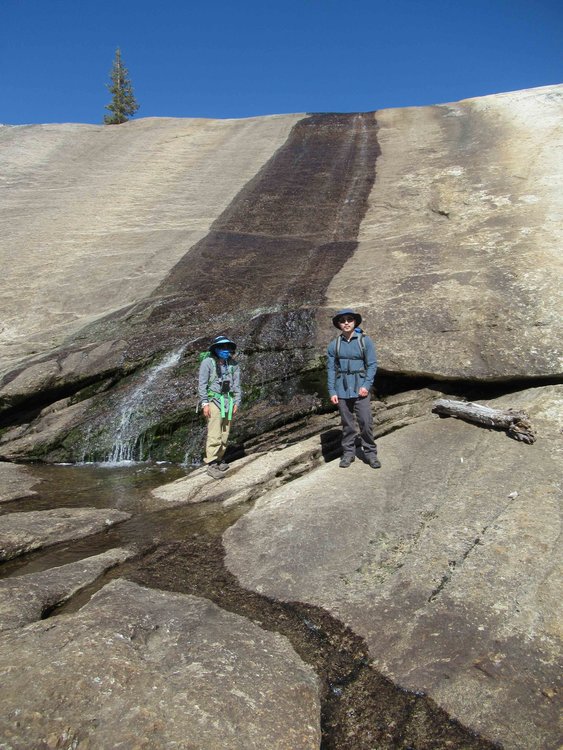 Dawn and Lee at the base of the lower step/falls during descent.