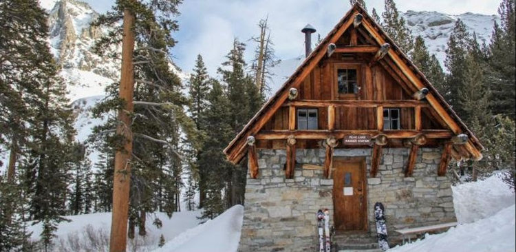 This is a photo showing the Pear Lake Winter Hut in the snow.<br />Photo by Aron Bosworth