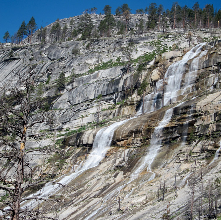 Lots of water tumbling down the cliffs near Bunnell Falls