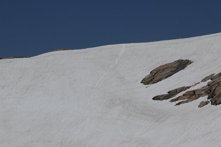 Bum skiing down the east side