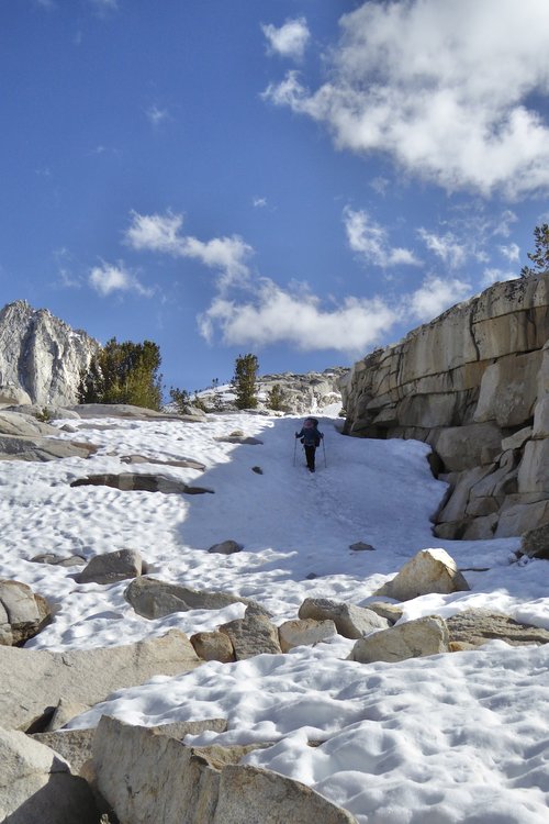 A snow field going up to the pass