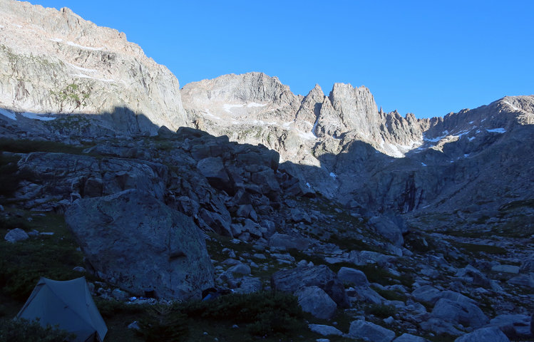 Sun hits peaks above camp