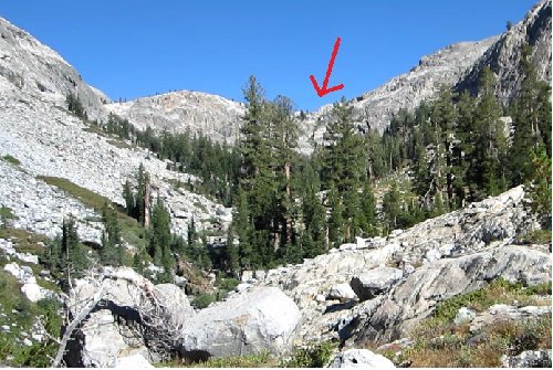 View from the bottom of lower Bench Canyon, with the arrow showing our route over the headwall