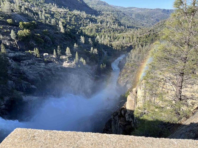 The dam shook with the force of the outlet and I hoped the rainbow was symbolic of fishing success later that day.
