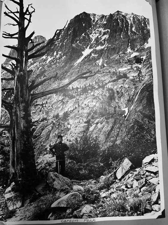 Me in early 1970 at &quot;the tree&quot; en route to climb Carson Pk in background.  This is a cell phone photo of my dad's home darkroom B&amp;W print.