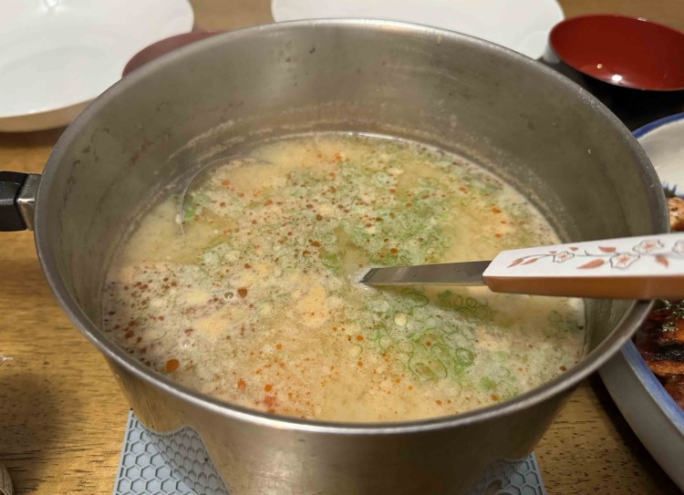 Lee's next level miso soup with the red oil droplets from the golden stock.