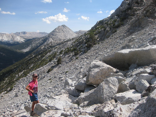 Jean, contouring around NW side of Glacier Divide. Pilot Knob in back