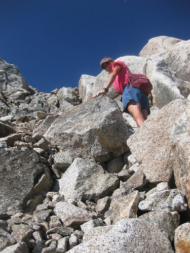 Jean scrambling out of Lake 10907 basin