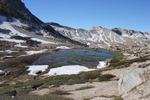 Lake to meadow from talus slog