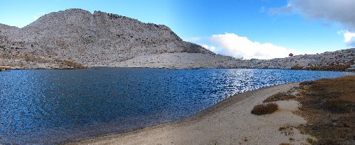 Sandy beach along the shore of Rainbow Lake